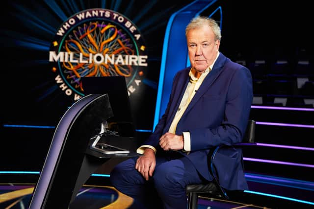 Jeremy Clarkson, sat in the host’s chair on set of Who Wants to be a Millionaire? (Credit: Stellify Media)