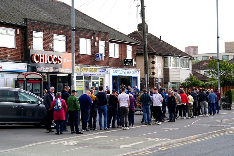 Fans queue for food ahead of the match