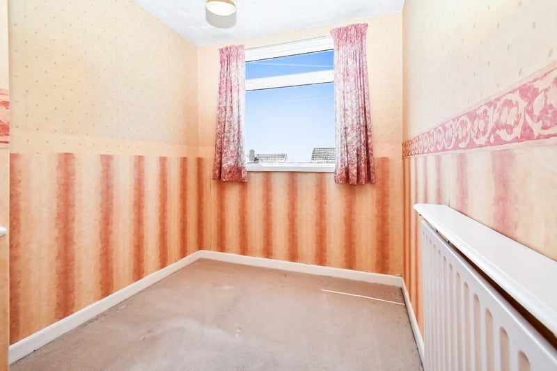 This smaller bedroom could be ideal for a small child.