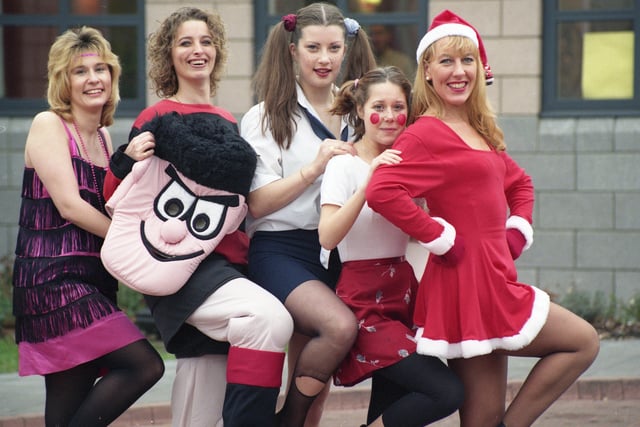 Students dressed in a variety of outfits for their Christmas pantomime workshop in 1996.
