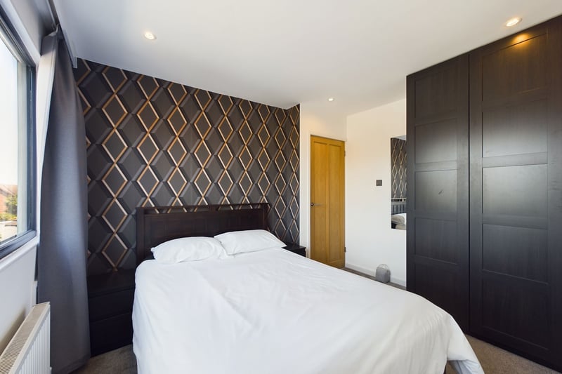 The spacious second bedroom with fitted wardrobes. Photo: Zoopla