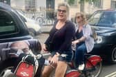 Suzy Eddie Izzard was spotted by a delighted fan careering around London on a Boris bike.