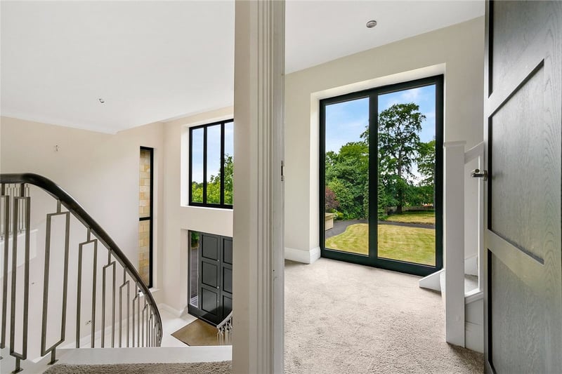 First floor landing gets lots of natural light from the large windows and doors. Picture by Fine & Country