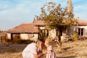 Jordan and Fae Vye outside their farmhouse in Bulgaria.