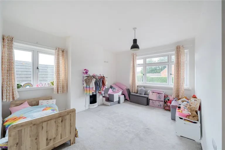 A bright double bedroom. Picture by Manning Stainton