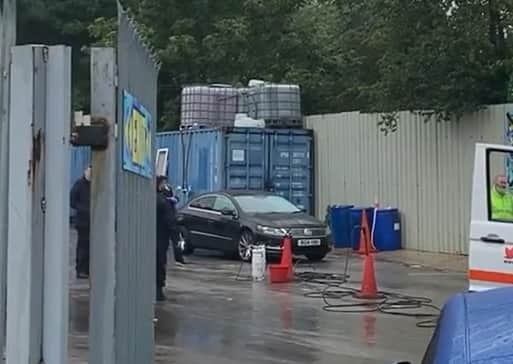 Police made safeguarding visits to eight Sheffield car washes and made six arrests on Wednesday (August 3) as part of a crackdown on modern slavery and human trafficking. Image taken from video distributed by SYP.