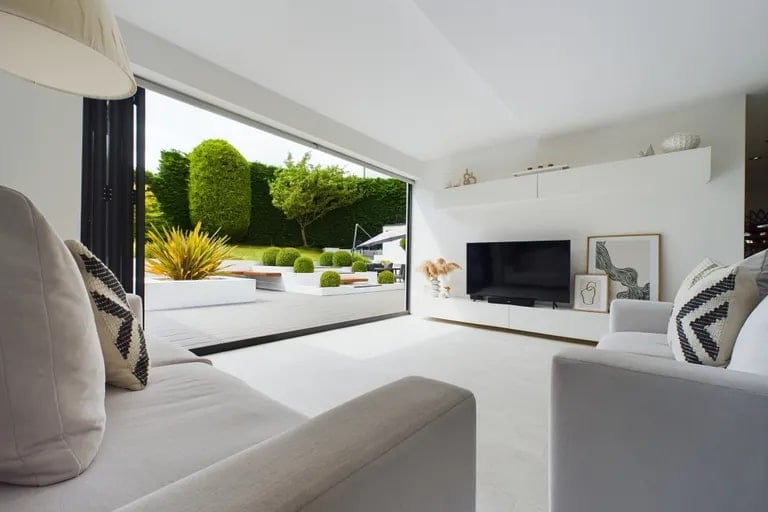 The living space can be opened up to the garden using the bi-folding doors. (Photo courtesy of Zoopla)