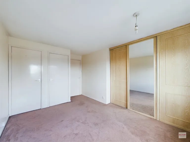 A large window in the bedroom provides lots of light. (Photo courtesy of Zoopla)