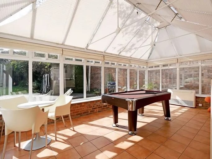 The conservatory is large and offers a great point to look out over the garden. (Photo courtesy of Zoopla)