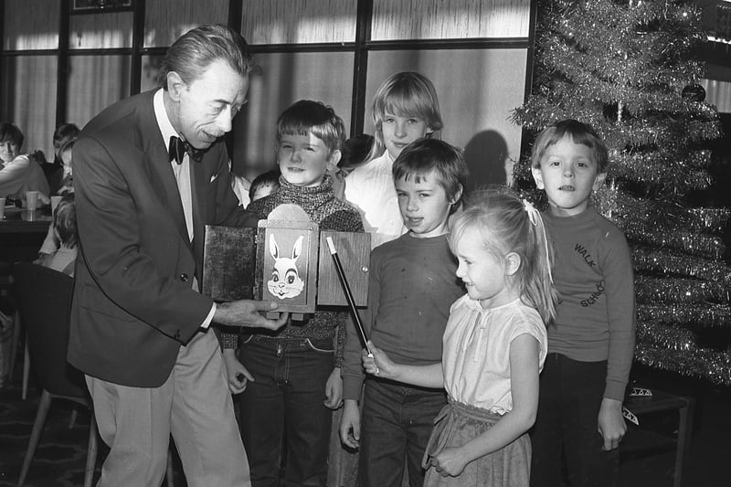 Youngsters enjoy the magic act at the Joplings Christmas breakfast 43 years ago.