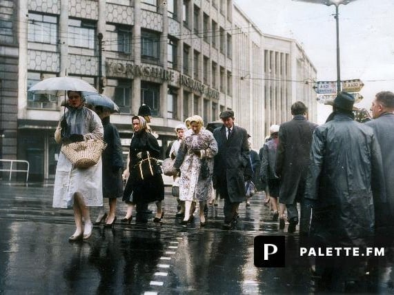 Umbrellas and plastic macs for Sheffield folk on their trek to work this morning. 21st October 1959