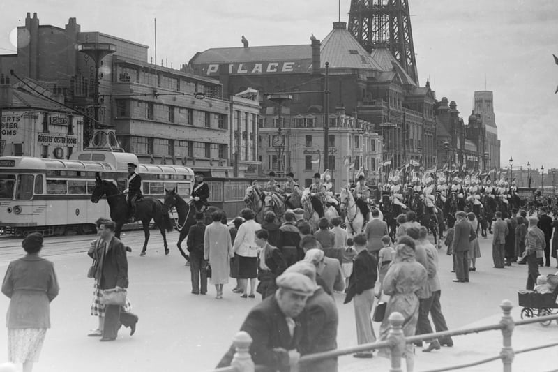 The Household Cavalry, in town for the Royal Lancashire Show, parade along  Blackpool Promenade, 1954