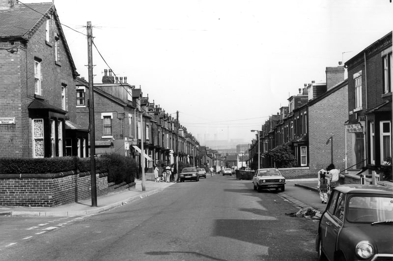 Looking east along Stratford Street in August 1983. The junction with Westbourne Mount is on the left then Bude Road crosses from left to right. Satvant Virdee's Fancy Cloth House can be seen on the right.