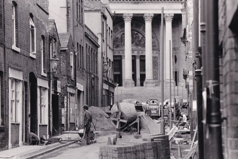 August 1986 and one of the less attractive city centre streets was at last getting a facelift. Park Cross Street opposite Leeds Town Hall had  long been in need to attention. Workmen were resurfacing the road and pavement with brick-type blocks similar to those used in recent developments at Albion Street and Albion Place.