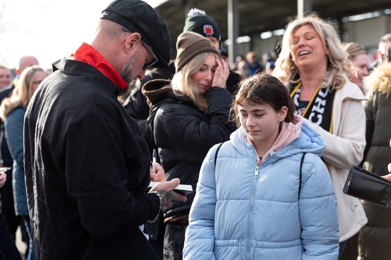 Boyzone singer Keith Duffy signing an autograph for one young fan at Victory Park on Saturday