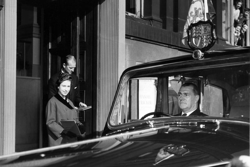 HM Queen Elizabeth II and HRH The Duke of Edinburgh leaving Leeds City Art Gallery to be met by a waiting car outside. The royal couple had been given a tour of the Art Gallery by director Mr R. S. Rowe as part of their two-day visit to Leeds.