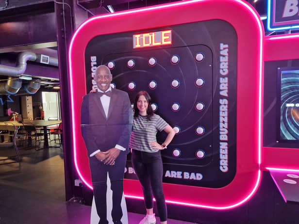 Reporter Kirsty Hamilton posing with (a carboard cut out of) genius Shaun Wallace, also known as the Dark Destroyer from The Chase at Gameshow All-Stars bar in Sheffield.