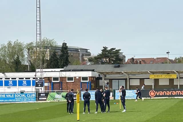 Chesterfield's players take a look at the pitch