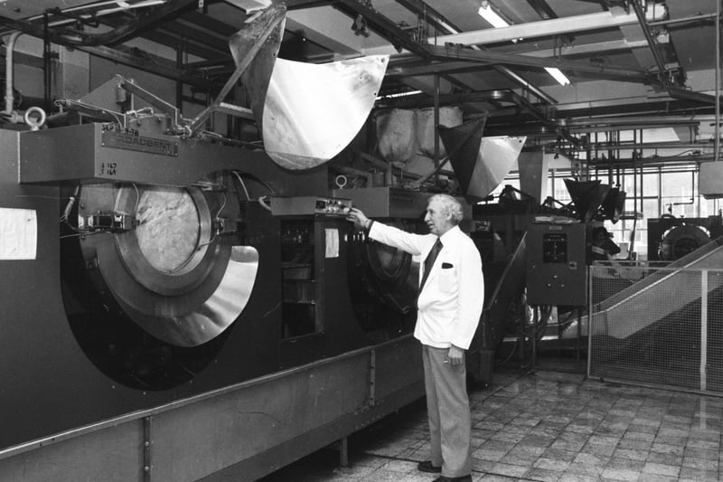 General Manager and director Charles Gowland checks the progress of another load of washing in 1981.