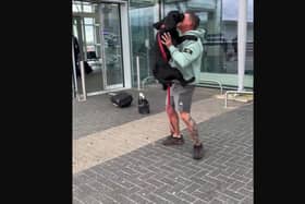 Joyous puppy is filled with excitement as he spots his human dad after being apart for a few days.