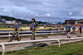 Sheffield's Kyle Howarth, Chris Holder, and guest Rory Schlein, salute the crowd after Sheffield's 50-40 win over Leicester at Owlerton. Photo: National World