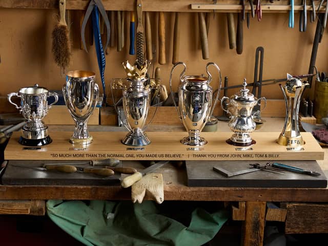 British Silverware was hired by the club’s owners to craft sterling silver cups to mark Jurgen Klopp's winning ways.
From left: League Cup, European Super-Cup, Premier League, Champions League, FA Cup and World Club Cup.
