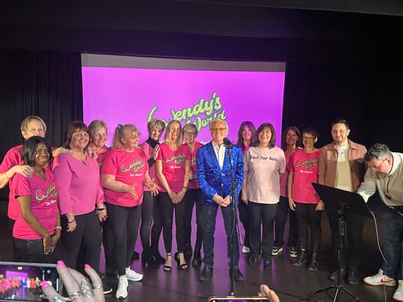 Tony Christie - pictured centre - and other celebrities sing on Check Your Boobs launch song from planned breast cancer awareness musical, Wendy's World