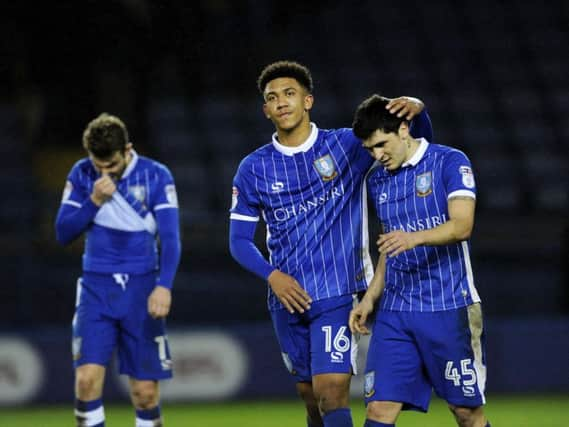 Liam Palmer consoles Fernando Forestieri at the final whistle