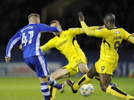 Sheffield Wednesday's Barry Bannan has a shot on goal against Burton