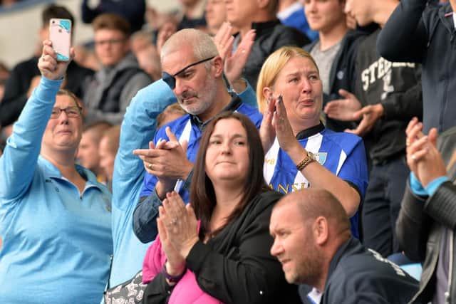 Pictured are Olivers paents David and Helen leading the tribute to their son