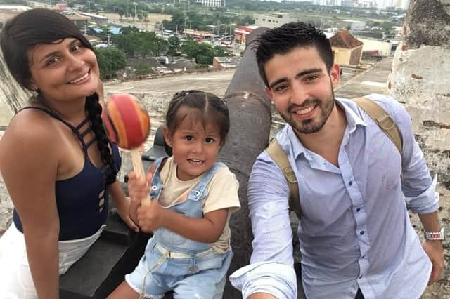 Jan Harvey Hoyos Leal with daughter Athena and wife Yesenia Paola.