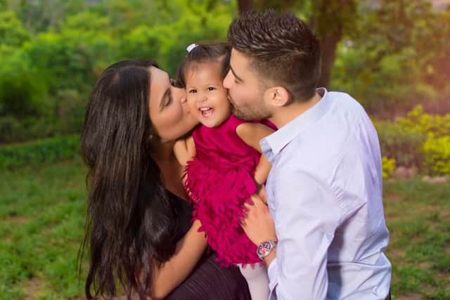 Jan Harvey Hoyos Leal with daughter Athena and wife Yesenia Paola.