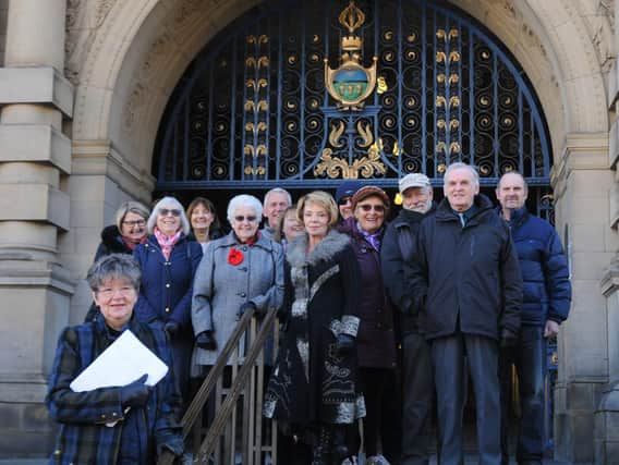 Campaigners from the Owlthorpe Fields Action Group hand in their petition at Sheffield Town Hall. Picture: Sam Cooper / The Star.