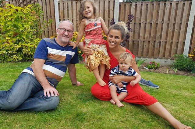 John and Rochelle Gilburn, pictured with their children Maisie and Joshua.