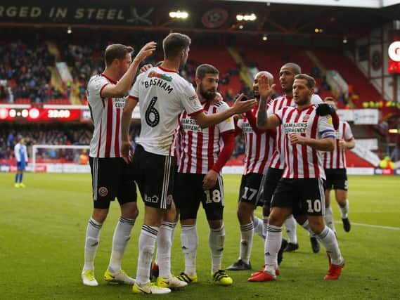 Chris Basham of Sheffield Utd is congratulated