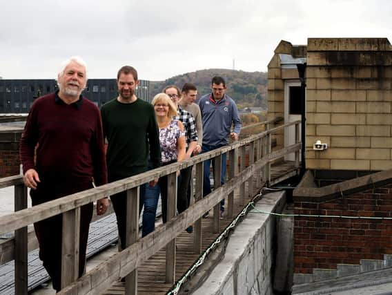 Bellringers at Sheffield Cathedral: making their way over the Cathedral roof to the bell tower