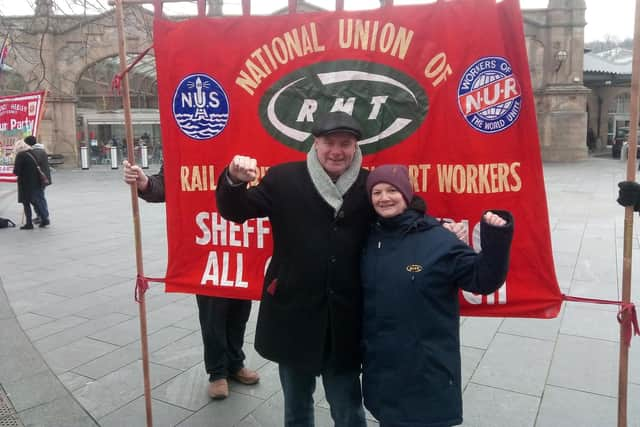 RMT senior assistant general secretary Steve Hedley and the union's Sheffield & District branch secretary Emma Abel outside Sheffield railway station