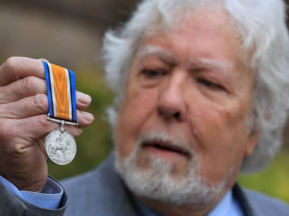 A WW1 Medal discovered by police divers has been reunited with the family. n October, divers from the Yorkshire and Humber Regional Marine Unit were carrying out operational activities in the River Loxley in Sheffield when they found a WW1 medal.



The medal, which belonged to Stephen Smith, is now being reunited with members of his family after a public appeal for information. Pictured is Julian Cliff from the family with the medal. Picture: Chris Etchells