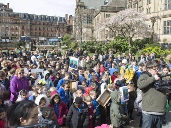 Youngsters gather outside the Town Hall.