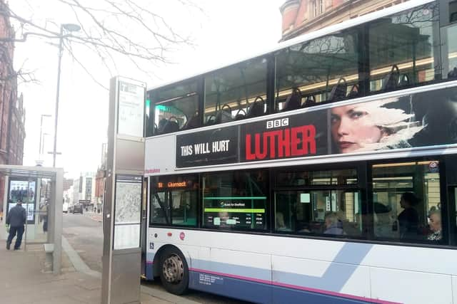 The number 51 bus stop opposite the Peace Gardens in Sheffield city centre