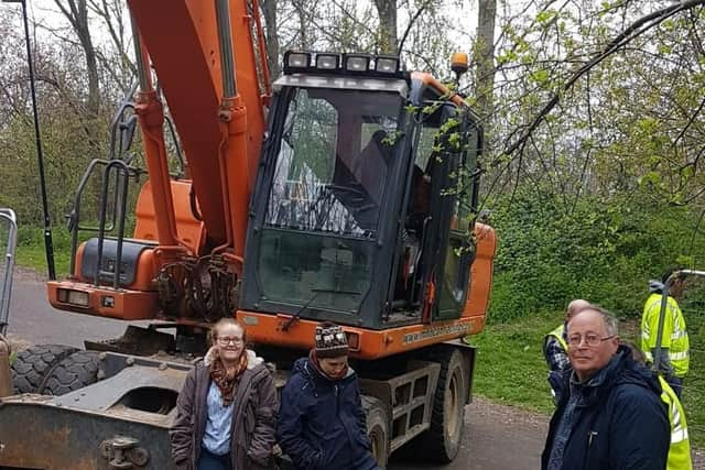 Protesters standing in the way of a bulldozer at the skate park in Philadelphia Gardens, Upperthorpe