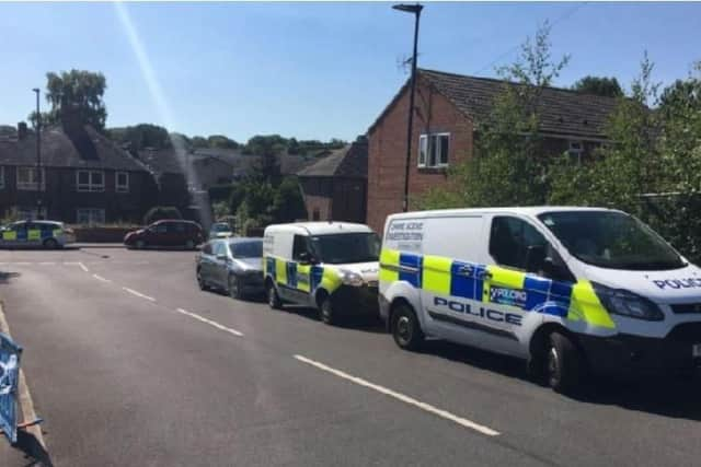 Police in Chapeltown following a fatal stabbing last year