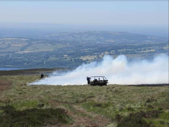 Gamekeepers are battling the blaze on Saddleworth Moor