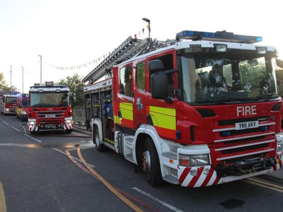 Firefighters at the scene on Carr Hill, Balby.