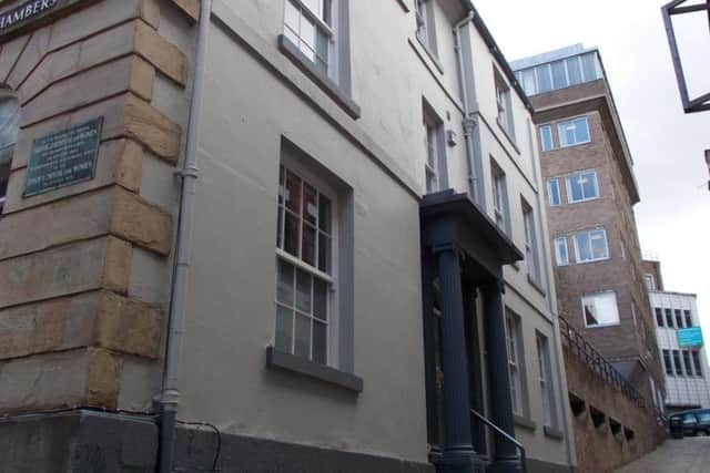 The original Jessop Hospital building on Figtree Lane, with a plaque visible on the wall