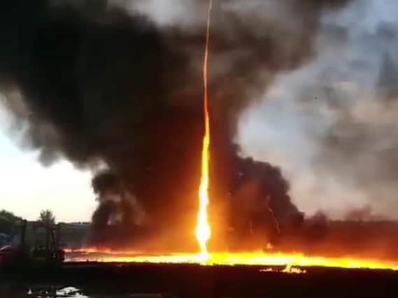 A screengrab taken from a video supplied by Leicestershire Fire and Rescue Service showing the moment a "firenado" engulfed a plastics factory in Swadlincote, Derbyshire. PIC: Leicestershire Fire and Rescue Service/PA Wire