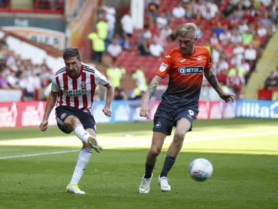 Chris Basham says Sheffield United's senior players will make Oliver Norwood feel at home