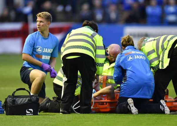 ChesterfieldÃ¢Â¬"s Sam Wedgbury is stretchered off the pitch: Picture by Steve Flynn/AHPIX.com, Football: Vanarama National League match Barrow -V- Chesterfield at Holker Street, Barrow, Cumbria, England copyright picture Howard Roe 07973 739229