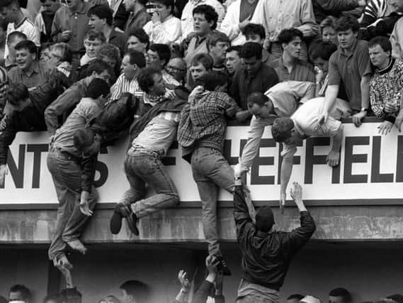 The Hillsborough disaster unfolding.