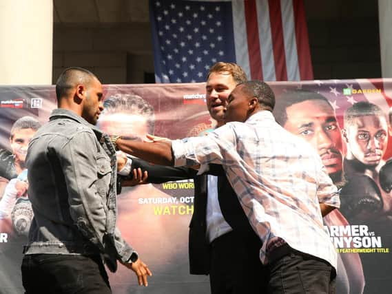 Kid Galahad at odds with Toka Kahn Clary (right.) Picture courtesy of Ed Mulholland/Matchroom Boxing USA